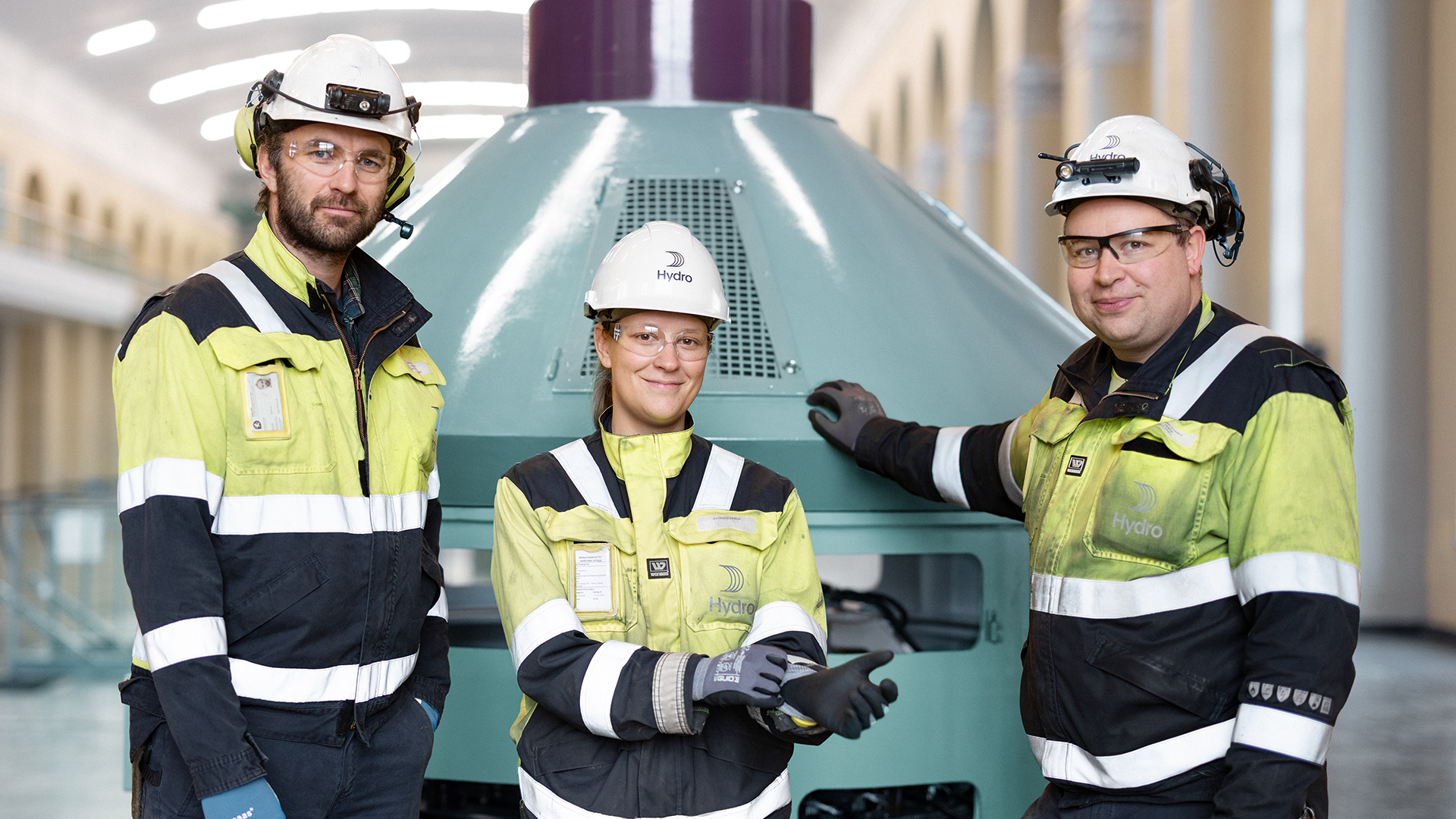 a group of people wearing safety vests and standing in front of a car