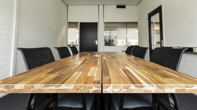 conference room with six chairs around a table