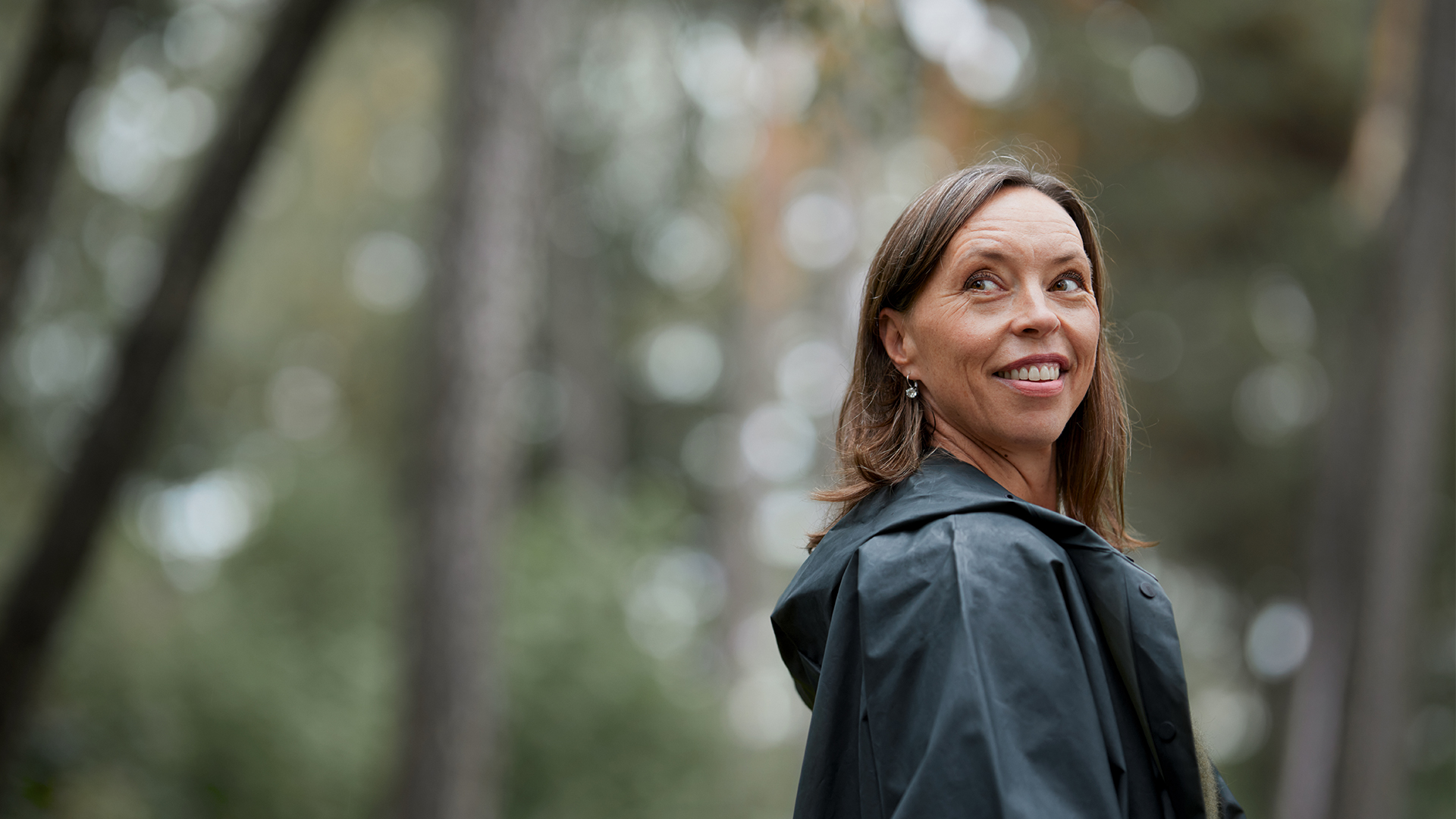 a person smiling outside