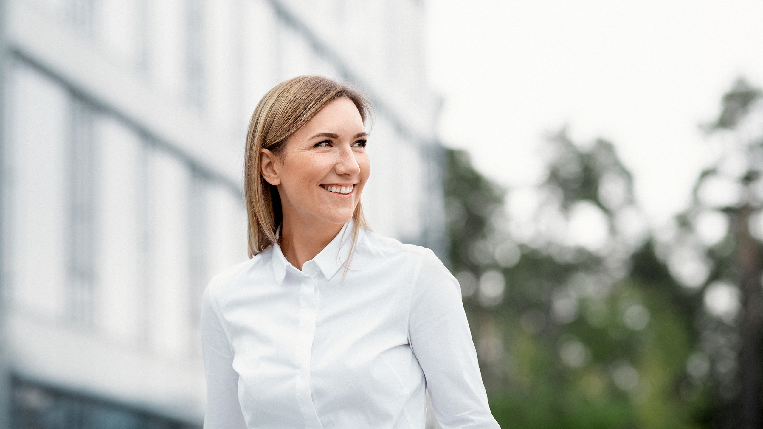 a person smiling outside