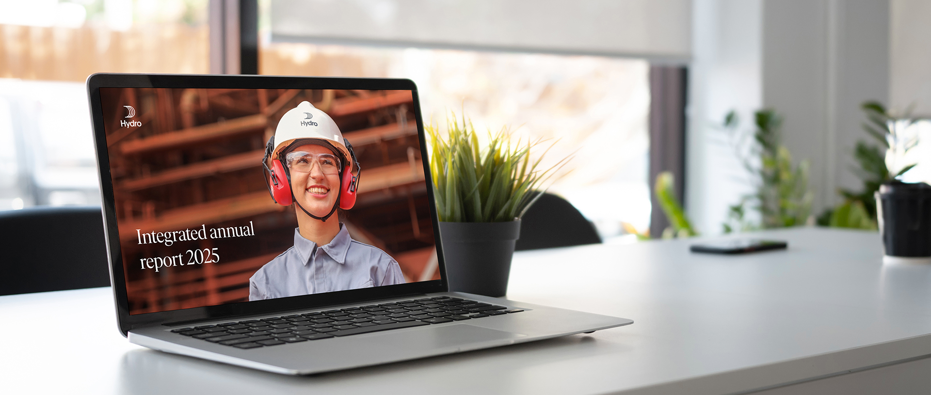 a laptop with a woman on the screen