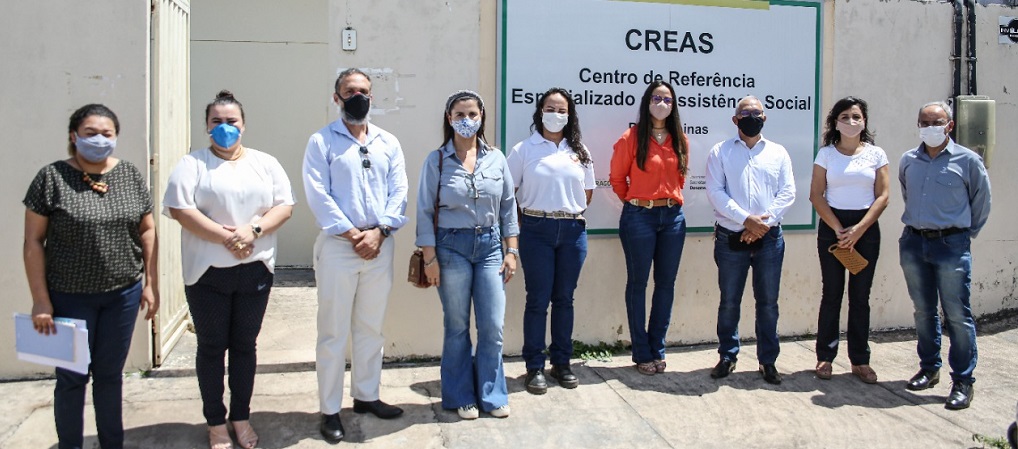 a group of people posing for a photo