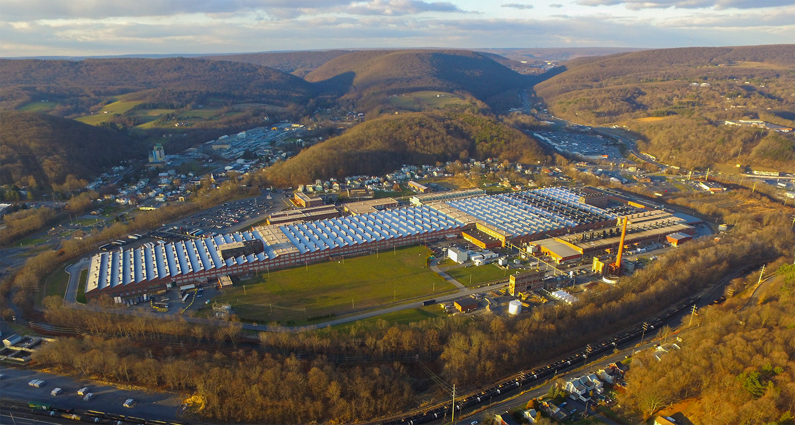 a large building with a parking lot