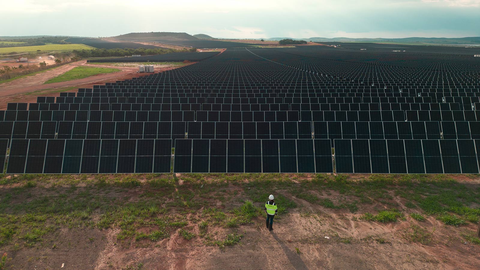 a person standing in front of the Boa Sorte solar complex