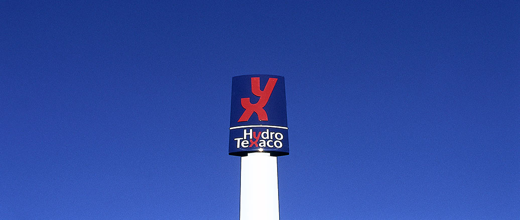A sign with the Hydro Texaco common logo