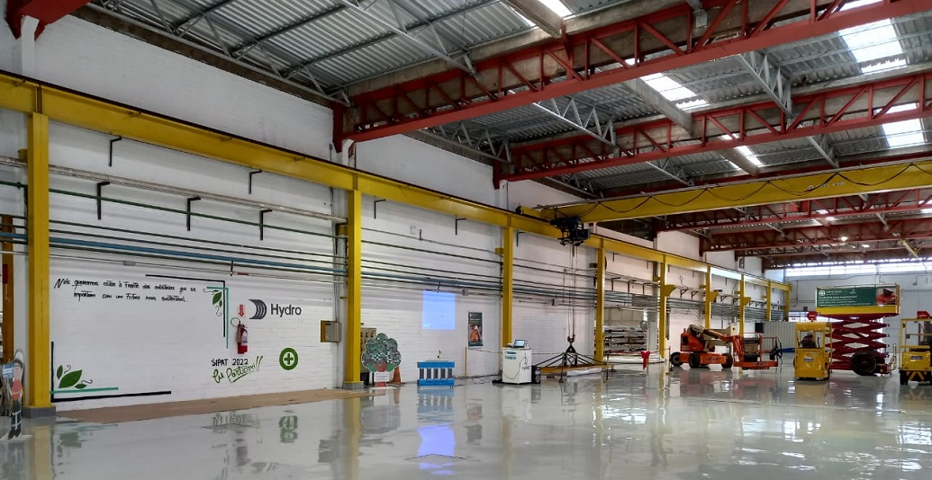 a large warehouse with a sign