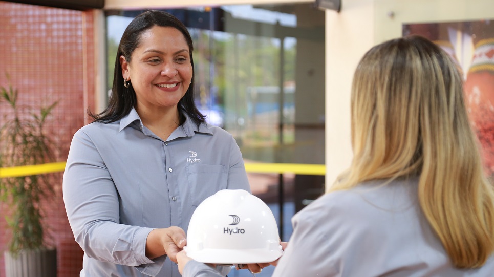 a person holding a helmet